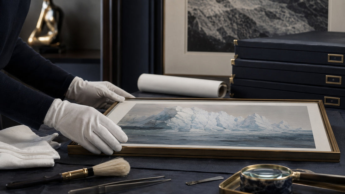 Framed artworks displayed on a gallery wall with controlled museum lighting